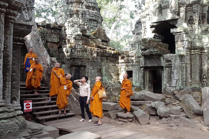 1day private tour all main temple in Angkor,sunset at TonleSap floating village - Angkor Thom and the gates: where the story turns intense