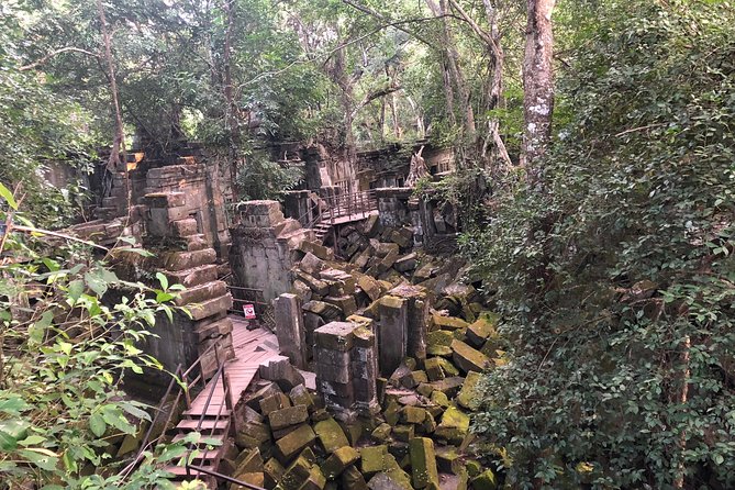 2 Days Discover Angkor Wat Complex and Cambodia's Villages Tours - Day 1: Angkor Wat, Ta Prohm, and the Faces at Bayon