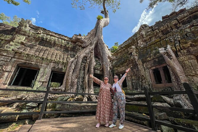 3 Day Angkor Wat Kulen Mountain Beng Mealea and Floating village - Ta Prohm and Angkor Thom: jungle roots and giant faces