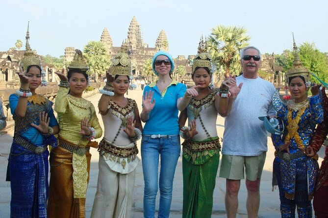 6-Day Private Cambodia Tour to Angkor Wat in Siem Reap and Phnom Penh - Angkor Thom, Bayon faces, Ta Prohm trees: the big temple day