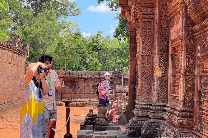 Angkor Highlight Sunrise Guided Tour & Banteay Srei Temple - Ta Prohm and Pre Rup: jungle roots, then a temple-mountain with a name that means something