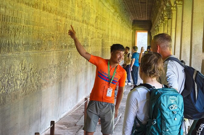 Angkor Sunrise Bike Tour - Breakfast & Lunch included - Ta Prohm: the trees that make the ruins feel alive