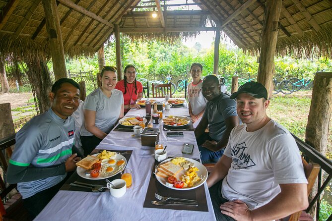 Angkor Sunrise Bike Tour / E-Bike or Tuk Tuk - Srah Srang lunch by the reservoir: Food, shade, and a reset