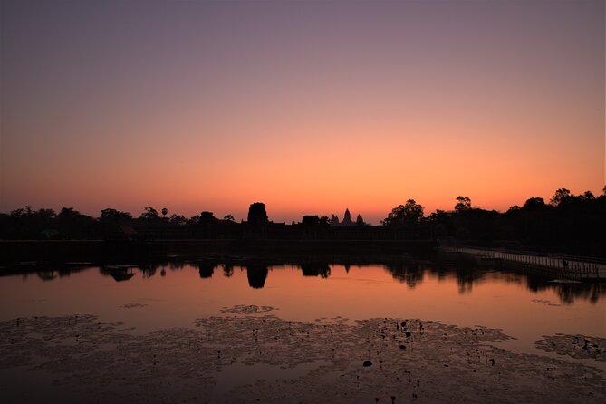 Angkor Sunrise Expedition Cycling Through Serene Backroads - Bayon Faces at Golden Hour Energy (Even If It’s Not Golden)