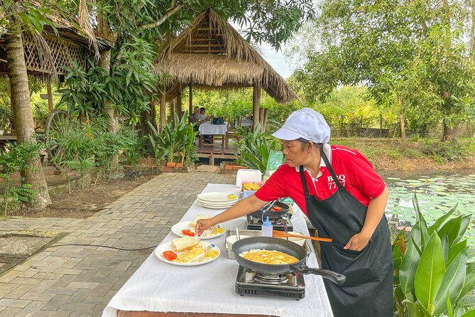 Angkor Sunrise Vespa Tour / Tuk Tuk or Car - Angkor Thom and Bayon: the Giant Face Temple up close