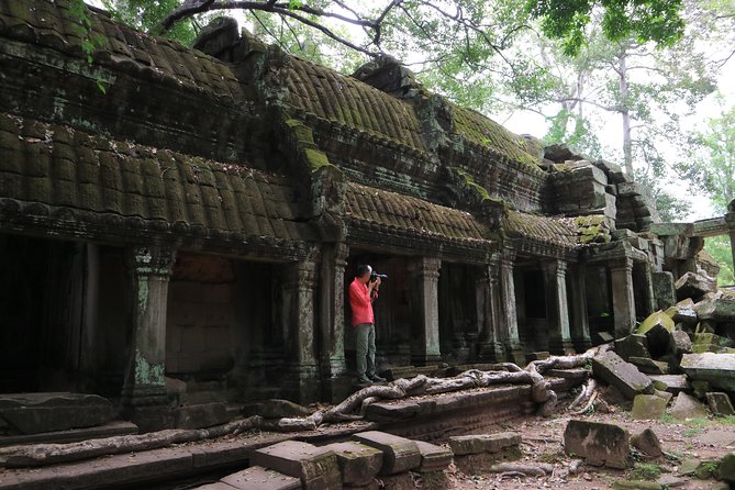 Angkor Temples Private Full-Day Tour from Siem Reap (Free Child) - Ta Prohm jungle temple: the photo magnet, with rain reality