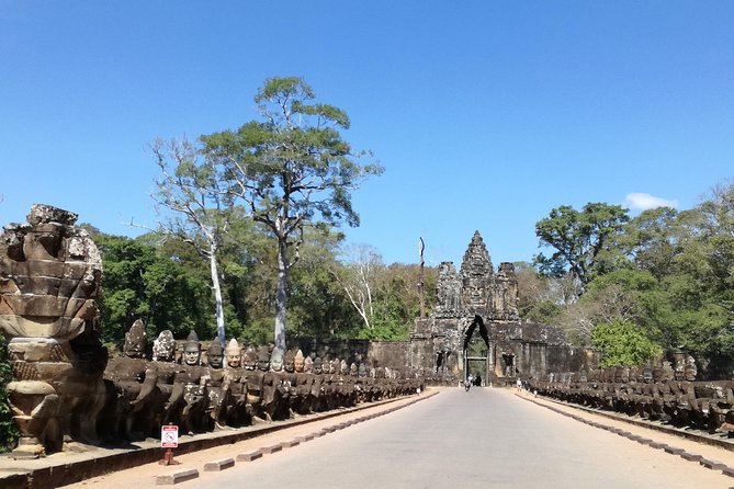 Angkor Wat & Floating Village 3-Day Private Tour - Day 1: Ta Prohm Roots, Angkor Thom Faces, and Angkor Wat in the Heat