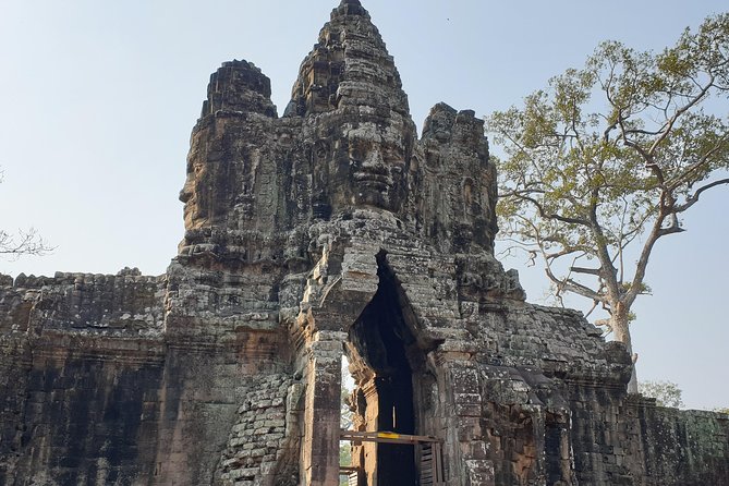 Angkor Wat Full Day Tour in Siem Reap Small-Group - Angkor Thom’s South Gate to Bayon: from the city wall to the famous faces