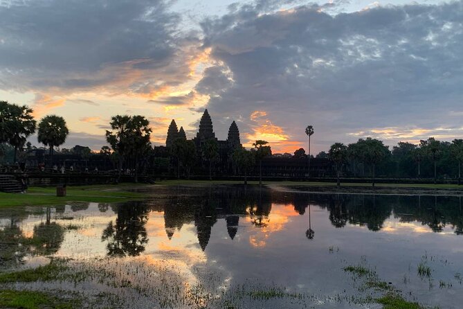 Angkor Wat Sunrise and Tonle Sap Cruise Sunset Tour - Angkor Thom from the South Gate: where devas meet asuras