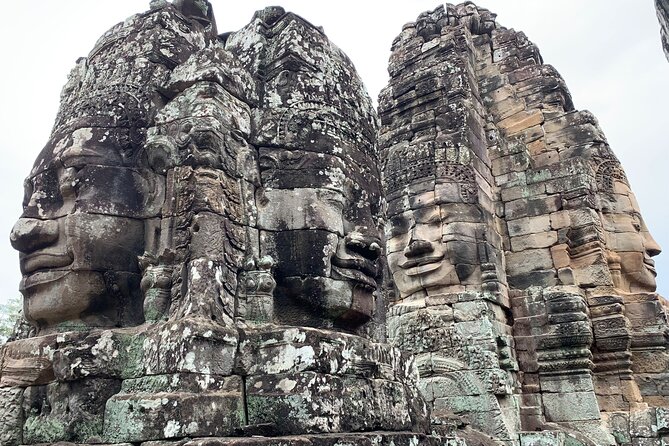 Angkor Wat Sunrise, Top 4 Temples and a Tranquil temple - Angkor Thom south gate and Bayon faces: the iconic towers with meaning