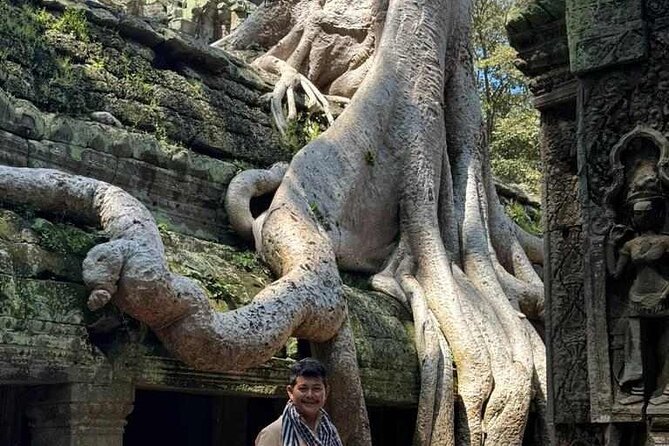Angkor Wat Sunrise Tours to Bayon and Ta Prohm Temple - The south gate to Bayon: where the faces take over