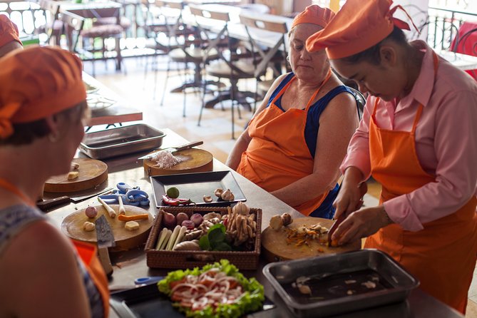 Award-Winning Cooking Class Experience with Professional Teacher - Inside the kitchen: chopping, cooking on flame, and timing