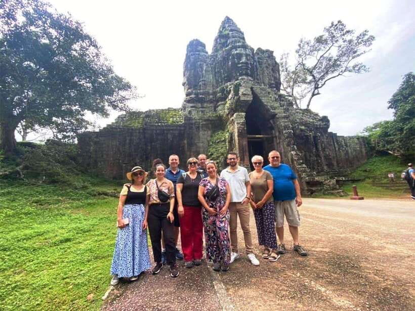 Explore Angkor Temple Sunset With Tour Guided - Entering Angkor Thom through the South Gate: more than a dramatic entrance