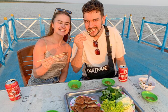 Floating Village Sunset Boat Vespa Tour / Tuk Tuk Available - Wat Po Banteaychey: Khmer snacks and a quick monastery stop
