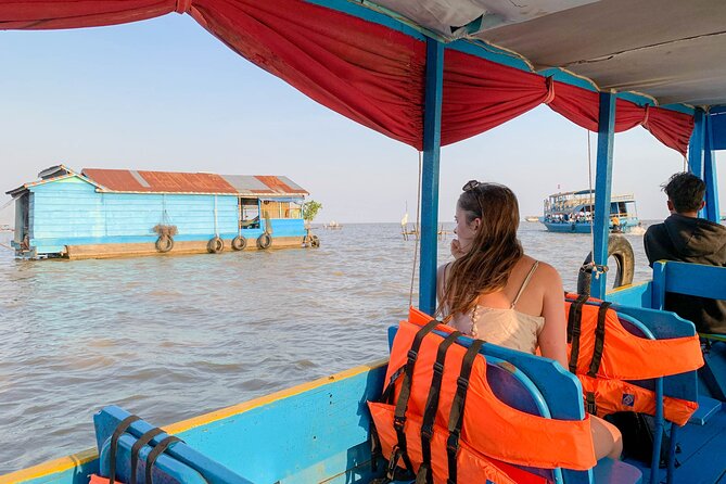 Floating Village Sunset Boat Vespa Tour / Tuk Tuk Available - Tonle Sap sunset from the upper deck: why the drink matters