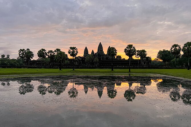From Siem Reap: Angkor Wat and Floating Village 3-Day Trip - Angkor Thom, Bayon smiles, and the views from Phnom Bakheng