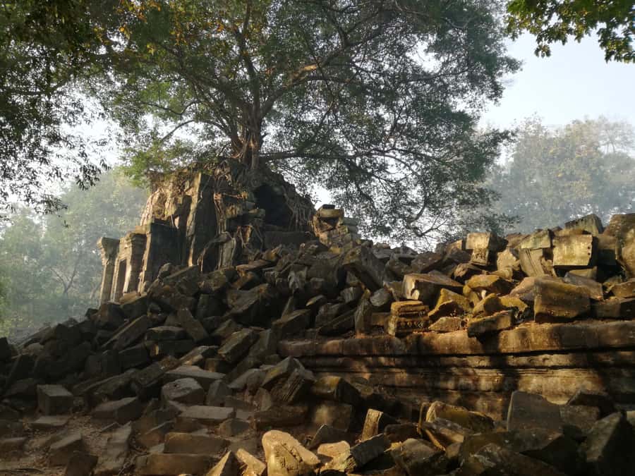 From Siem Reap: Half-Day Tour to Beng Mealea Temple - Inside Beng Mealea: 2 Hours of Tumbled Blocks and Wooden Paths