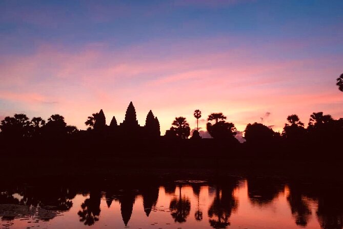 Golden Hours: Angkor wat sunrise photography tour with a pro! - Bayon in Angkor Thom: faces, symbolism, and a smart break