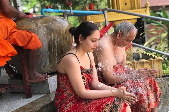 Monk Blessing Ceremony in Siem Reap - A realistic look at discomfort: getting wet without ruining your day