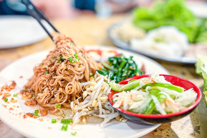 Old Siem Reap Sunset Food Tour by Tuk-tuk - Yi Nget beef sticks: the old-stall to restaurant success story