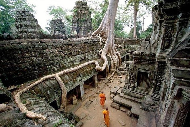 Private Angkor Wat Sunrise Tour - Bayon Temple Inside Angkor Thom: The City at the Core
