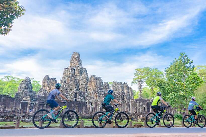 Siem Reap: Angkor Sunset Bike & Boat Tour /E-Bike Available - Early refuel: water, fresh fruit, and an easy pace