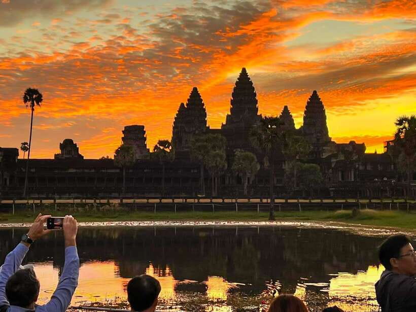 Siem Reap: Angkor Wat 2-Day Tour with Sunrise and Sunset - Day 1 stops: Ta Prohm, Bayon (smiling faces), Ta Keo, and the South Gate