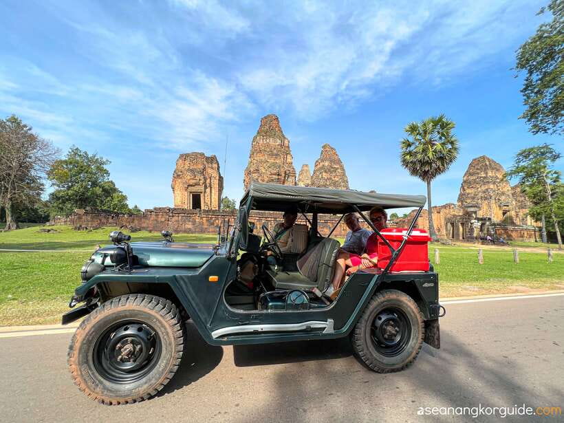 Siem Reap: Angkor Wat Sunrise and Market Tour by Jeep - Sunrise at Angkor Wat from a Jeep: the mirror-morning moment