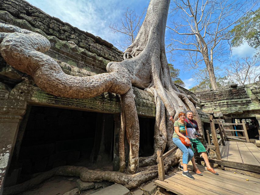 Siem Reap: Angkor Wat Sunrise and Market Tour by Jeep - Ta Prohm and Ta Nei: jungle temples that look like the world is taking them back