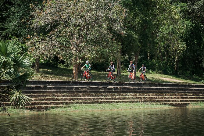 Siem Reap: Angkor Wat Sunrise Bike Tour & Jungle Breakfast - Biking Between Temples: Shaded Roads and Off-Beat Paths
