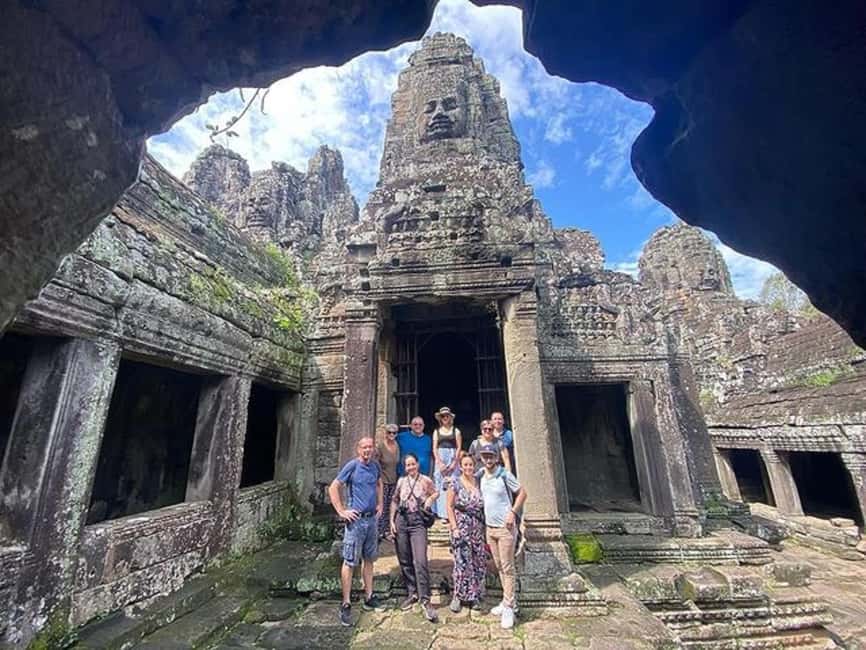 Siem Reap: Angkor Wat Tour with French-Speaking Guide - Day 1 Small Circuit: South Gate Faces, Bayon Smiles, and Ta Prohm Roots