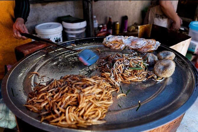 Siem Reap Authentic Breakfast and Market Tour - Stop 3: Wat Bo Temple and Bai Set Chrouk’s Grilled Pork Rice