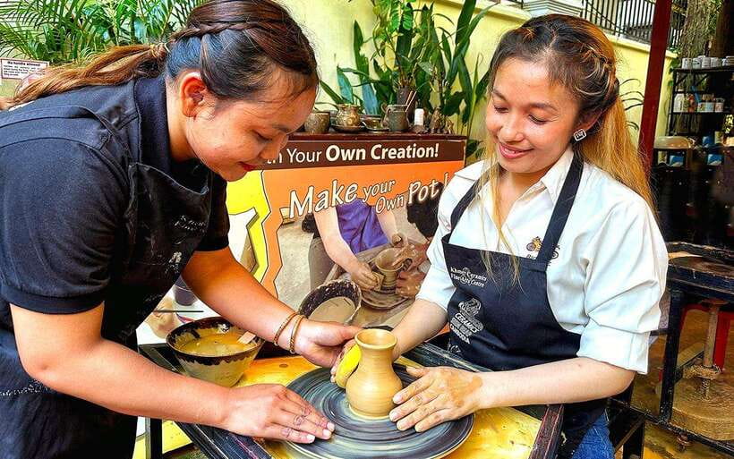 Siem Reap: Cambodian Pottery Class - From clay to bowl: getting control on the manual wheel