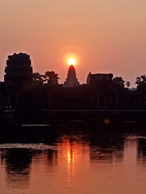 Siem Reap Private Tour: Angkor Wat Sunrise And Banteay Srei - Bayon Temple in Angkor Thom: Faces Everywhere
