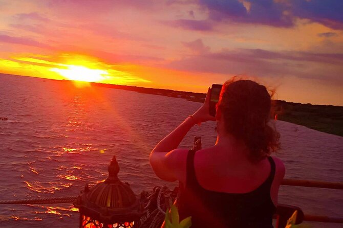 Sunset Dinner and drinks includes a Floating Village cruise tour. - Queen Tara on Tonlé Sap: dinner setup and sunset views