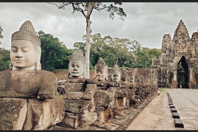 Unveil The Magic Of Angkor Wat Sunset In A Day Personalized Tours - Bayon and the Almost-200 Smiling Faces of Angkor Thom